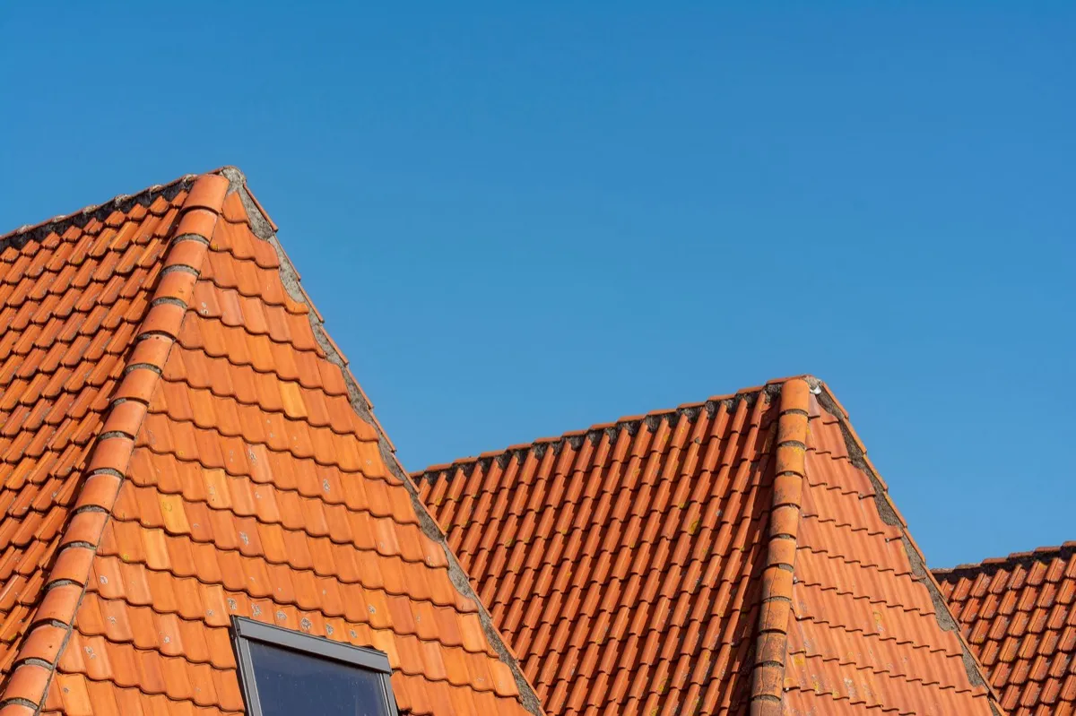 Clay barrel tile rooflines on homes in Novi, MI